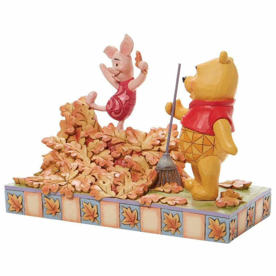 Disney Traditions Figurine - Piglet and Pooh Jumping into Fall with Autumn Leave