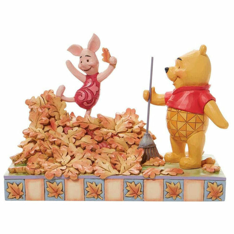 Disney Traditions Figurine - Piglet and Pooh Jumping into Fall with Autumn Leave