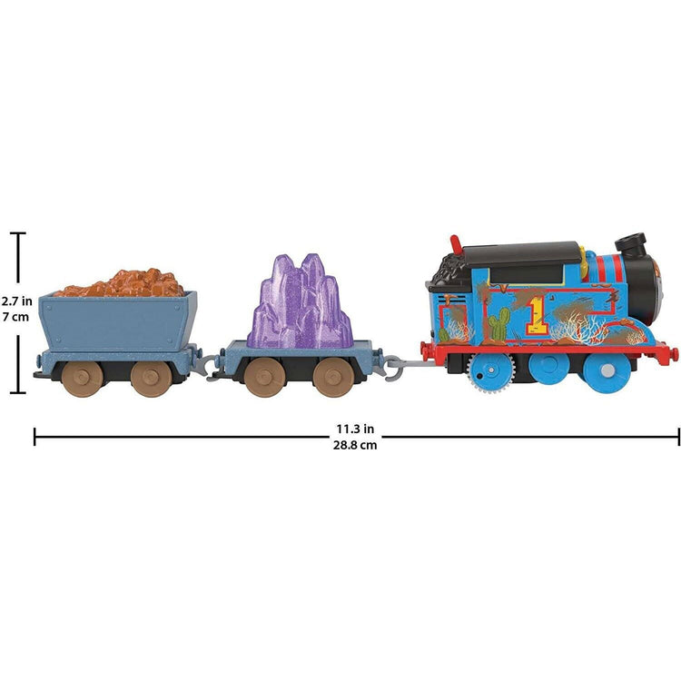 This is a toy train engine from the Fisher-Price Thomas & Friends line, featurin