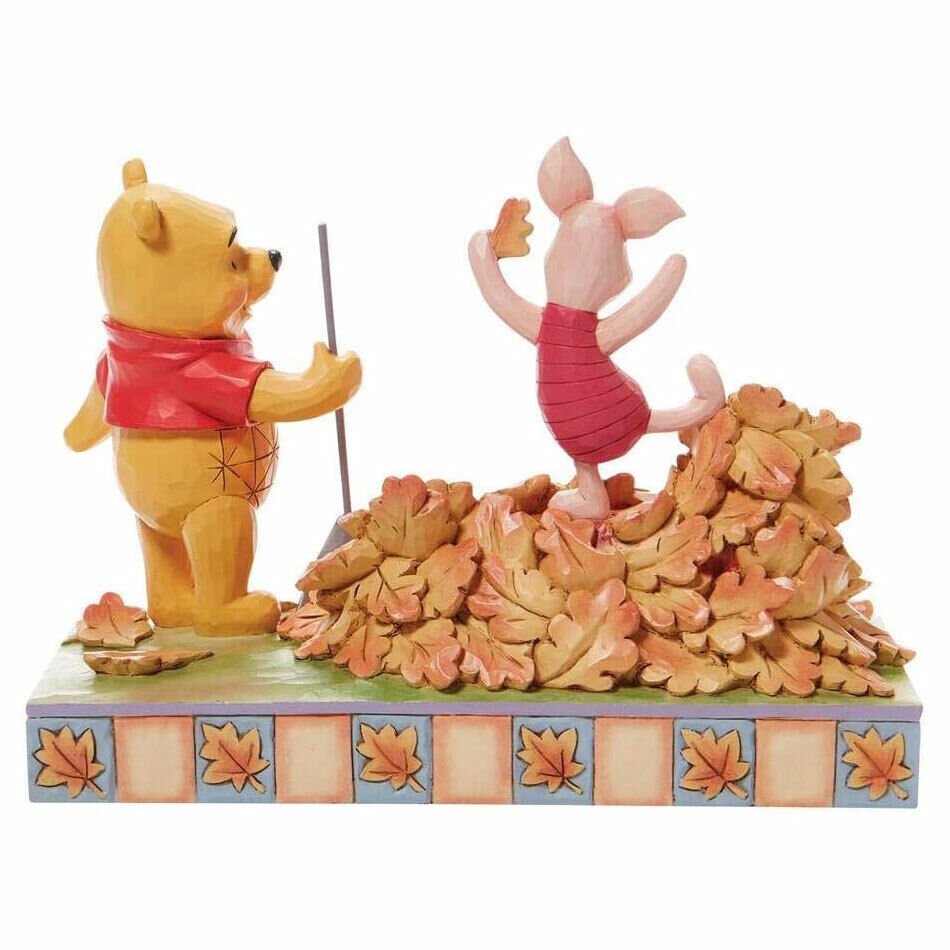 Disney Traditions Figurine - Piglet and Pooh Jumping into Fall with Autumn Leave
